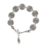 Women's silver floral bracelet with yellow stones